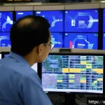 Home 21 교통직 실습 경험 후기 - A bustling urban traffic control center interior during peak hours, featuring large digital screens ...